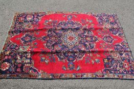 A Tabriz Red/Blue Carpet