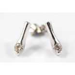 A Pair of White Gold and Diamond Drop Earrings