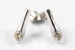 A Pair of White Gold and Diamond Drop Earrings