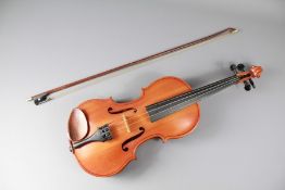 An Eastern European 3/4 Violin and Bow