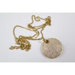 An 18ct Yellow Gold Pave Set Diamond Disc Pendant