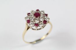 A 9ct Ruby and CZ Cluster Ring