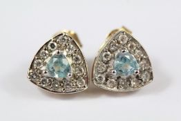 A Pair of Aquamarine and Diamond Earrings