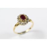 An 18ct Yellow Gold Ruby and Diamond Cluster Ring