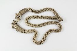 A Chinese White Metal Dragon Necklace