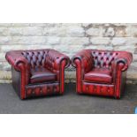 A Pair of Claret Leather Button Back Club Chairs