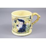 An Early 20th Century Yellow/Green Glazed 'Surprise' Mug