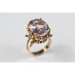 A 9ct Yellow Gold and Amethyst Ring