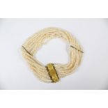 An Antique Continental Nine Strand Fresh Water Pearl Choker