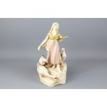 A Royal Dux Figure Group "The Goose Girl" Spill Holders