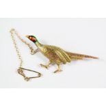 A Tri-gold Pheasant Brooch