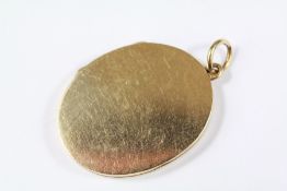 A Lady's Oval 9ct Gold Locket