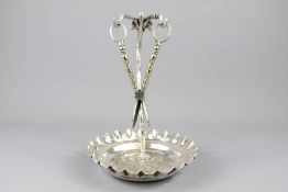 A Silver Plated Grape Stand and Scissors