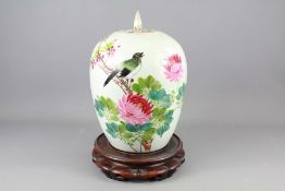 A Chinese Early 19th Century Famile Rose Ginger Jar and Cover