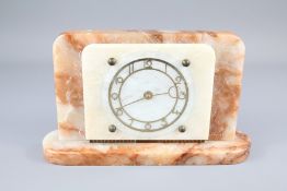 An Art Deco Rose Coloured Alabaster Mantel Clock