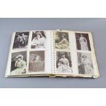 An Album of Early 20th Century Black and White Photographic Postcards