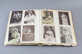 An Album of Early 20th Century Black and White Photographic Postcards