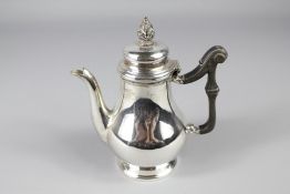 A Miniature Silver Coffee Pot