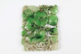 A Chinese Green Carved Jade Amulet