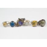 Six Silver Mounted and Semi-Precious Stone Rings