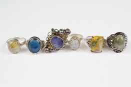 Six Silver Mounted and Semi-Precious Stone Rings