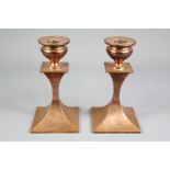 A Pair of Arts & Crafts Copper Candlesticks