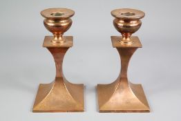 A Pair of Arts & Crafts Copper Candlesticks