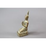 A South Asian Brass Miniature Figure of Buddha