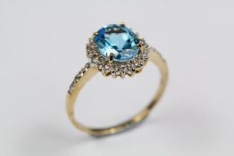 A 9ct Yellow Gold Blue Topaz Ring