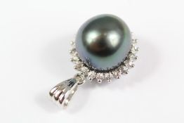 A 14ct White Gold Diamond and Black Pearl Pendant