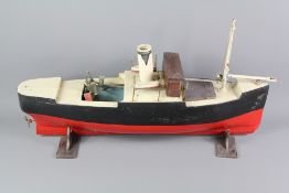 A Vintage Steam Pond Tug Boat