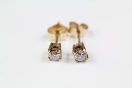 A Pair of Solitaire Diamond Earrings
