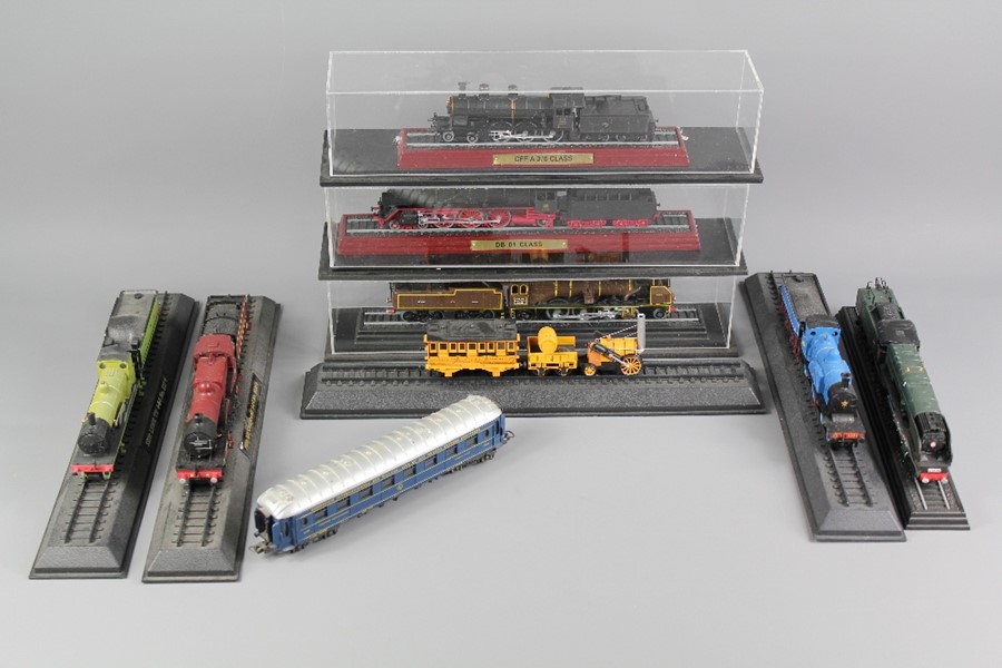 Twelve Model Railway Locomotives and Passenger Coaches