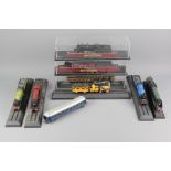 Twelve Model Railway Locomotives and Passenger Coaches