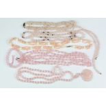 A Collection of Pink Quartz Necklaces