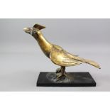An Antique Gilt Bronze Model of a Winged Bird
