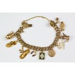 A Middle Eastern 14ct Yellow Gold Charm Bracelet