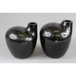 A Pair of Black Glass Vases