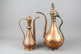 Two Islamic Copper Ewers