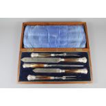 An Edwardian Silver and Horn Handled Carving Set