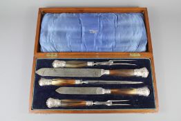 An Edwardian Silver and Horn Handled Carving Set