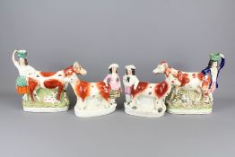 Four 19th Century Staffordshire Spill Vases