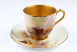 A Royal Worcester Demi-Tasse and Saucer