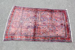 A Hamedan Red/Blue Carpet
