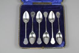 A Set of Silver Teaspoons