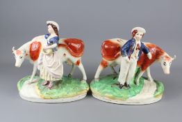 A Near Pair of 19th Century Staffordshire Spill Vases