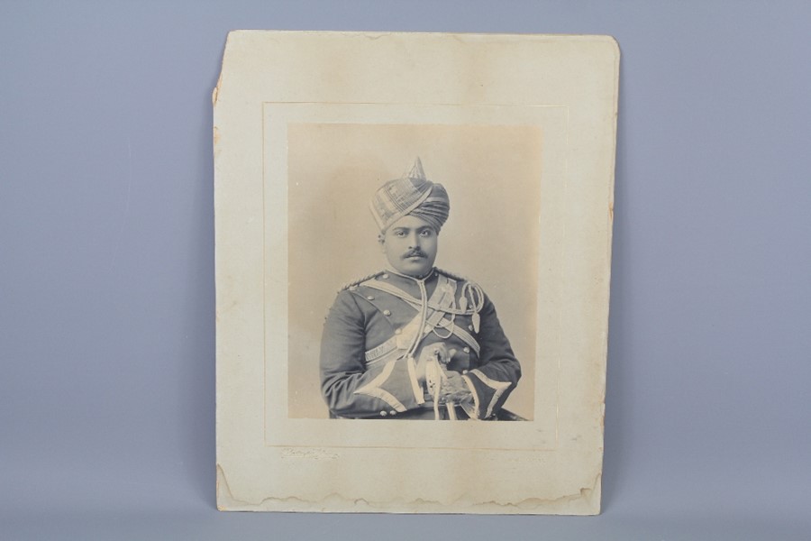 A Black and White Photograph of an Indian Officer