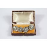 A Pair of Platinum Mother of Pearl and Seed Pearl Cufflinks