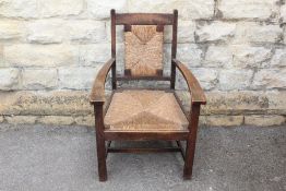 An Oak Arts & Crafts Armchair