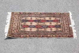 A Baluch Cream Carpet